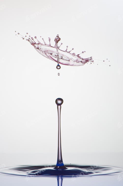 Preview: Splash of colorful liquid with high speed flash