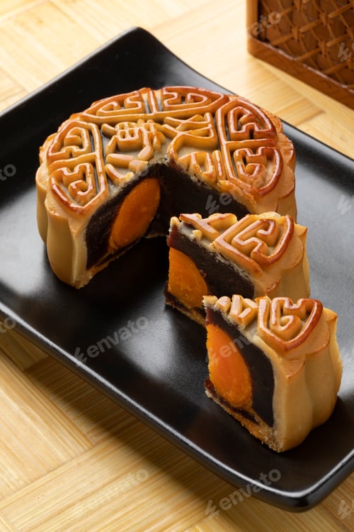 Preview: Fresh baked traditional Chinese mooncake stuffed with red bean paste and eggs