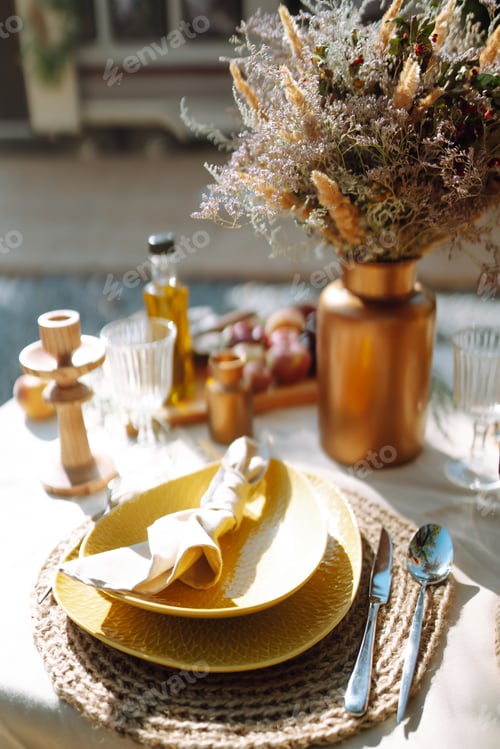 Preview: Floral decorations on the banquet table outdoor. The work of professional florists in emerald color.