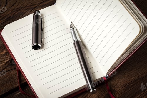 Preview: Blank notebook and ink pen.
