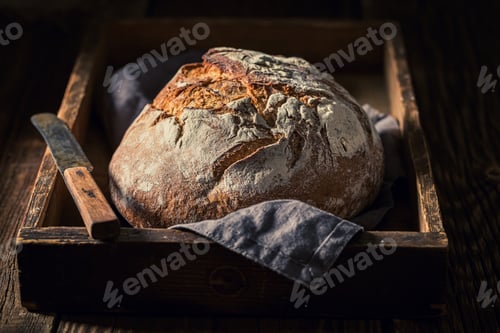 Preview: Closeu of load of bread with sausage, butter and salt