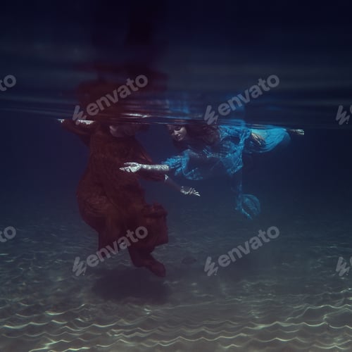 Preview: Two Girls In Dresses Play Underwater