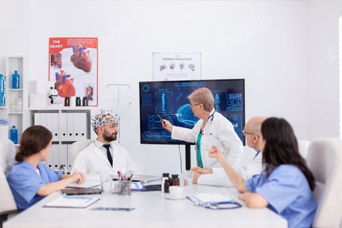 Preview: Neurologist senior woman doctor presenting brain medical expertise during healthcare conference