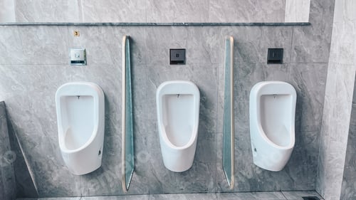 Preview: Men's toilet. Row of outdoor urinals men public toilet, Closeup white urinals in men's bathroom.