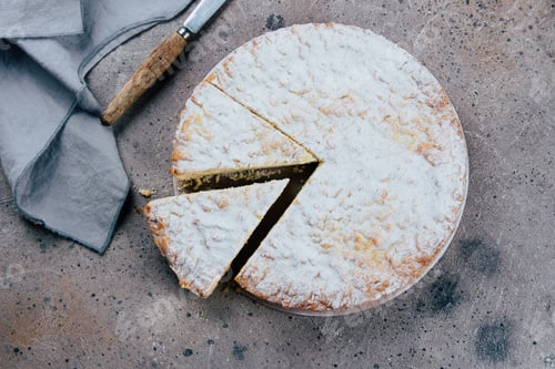 Preview: Homemade cottage cheese pie cake on stone table background, top view