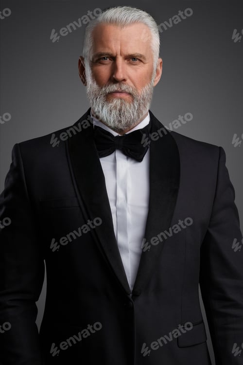 Preview: Handsome and sophisticated gentleman is dressed in an elegant black suit