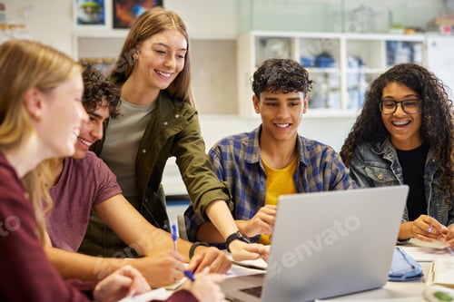 Preview: Happy smiling teens students studying in group