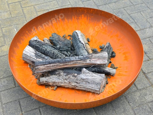 Preview: outdoor iron fire pit bowl with burnt firewood