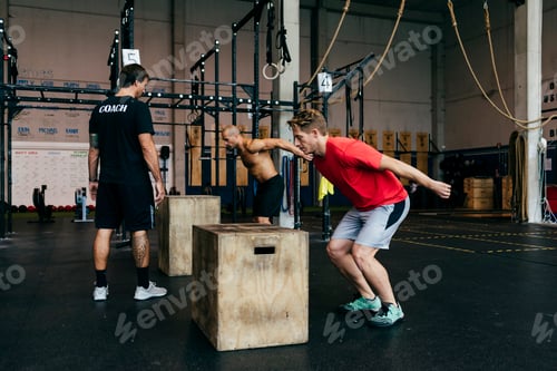 Preview: People training hard in gym