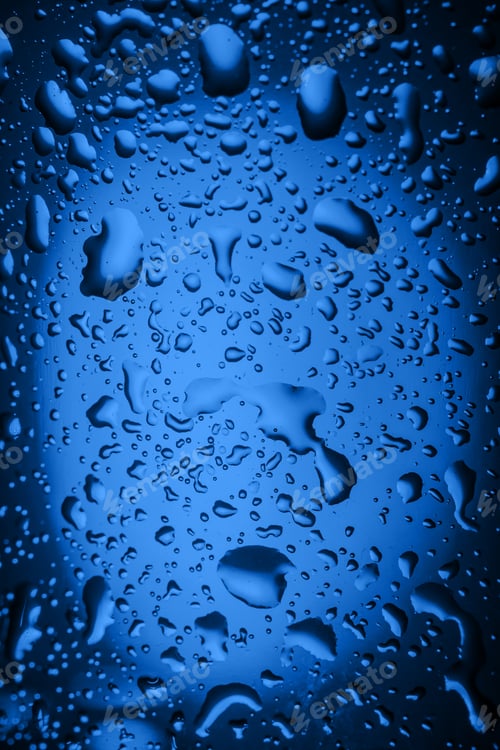 Preview: close up. drops of water on a glass of water