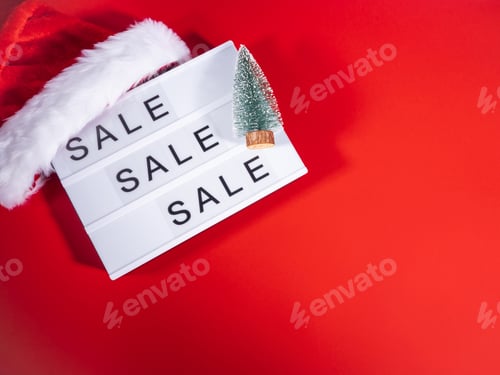 Preview: Christmas sale, boxing day lightbox on red with santa cap