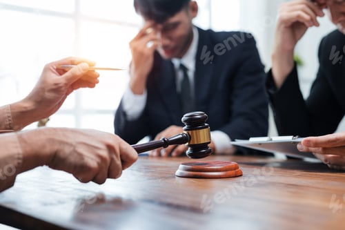 Preview: Gavel impacting sound block during legal consultation