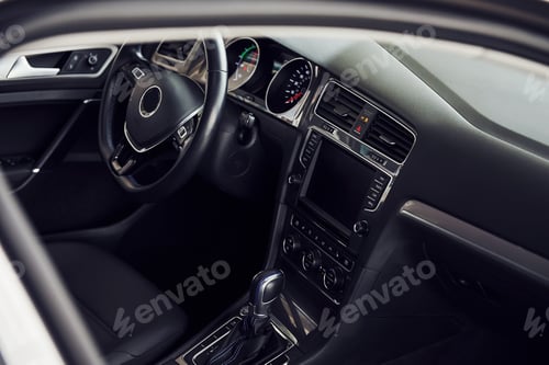 Preview: Inside of brand new modern electrical car. Particle view. Cropped photo