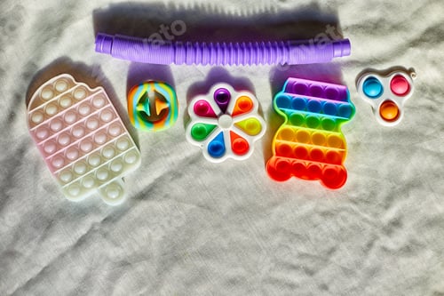 Preview: Top view of trend colorful push pop it bubble sensory fidget toys of different shapes