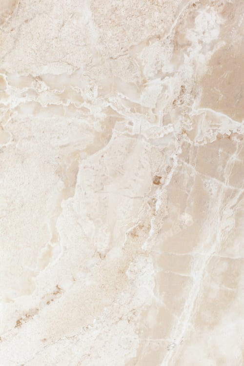Swirling Patterns in Beige and White Stone Texture