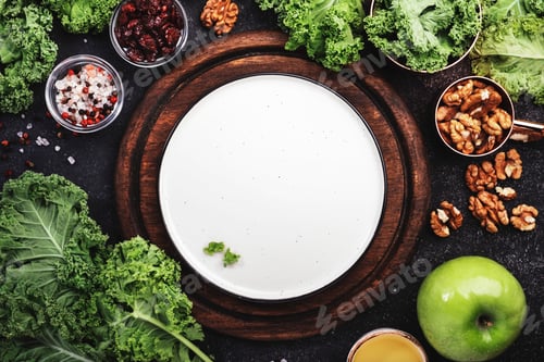 Preview: Kale salad preparing. Source of dietary fiber: dried cranberry, green apples and walnuts