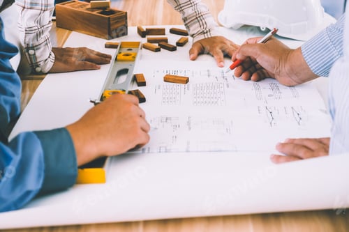 Preview: Team of engineers discussing architecture plan sketch at the construction site.