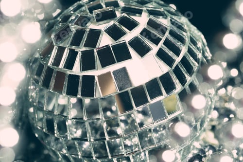 Preview: Mirror balls reflecting lights close up, nightlife background