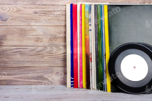Preview: Vinyl records and headphones on table. Vintage vinyl disk