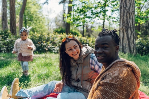 Preview: Multiracial family having fun in the park