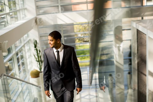 Preview: Young black man walking in the office