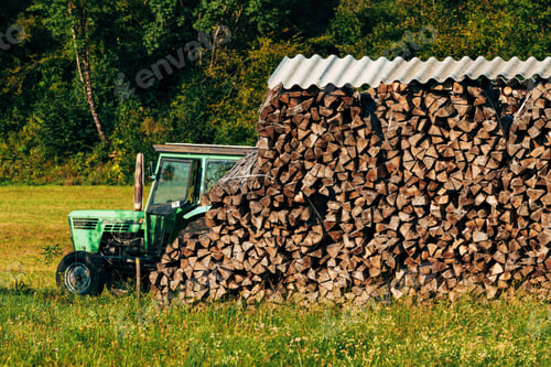 Preview: Chopped firewood stack on farm, drying for winter season