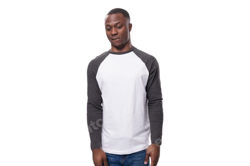Preview: a young kind American man dressed in a jacket with sleeves is shy on a white background