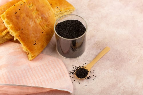 Preview: a top view baked bread hot tasty fresh sliced with pepper on the pink background bakery dough pastry