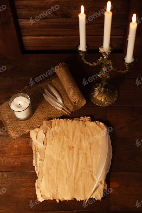 Preview: Halloween still life with burning candle on witch book and magic objects