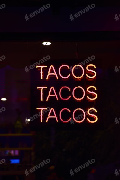 Preview: Bright neon sign in the window of a diner.