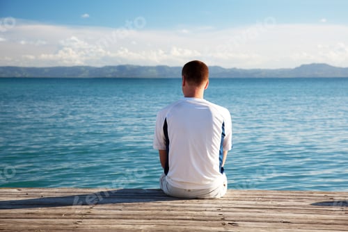 Preview: Young Man Relax Watch On Ocean