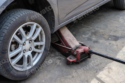 Preview: Repairing car with lifting up in shop