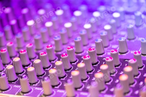 Preview: Close up detail of a music mixer control panel