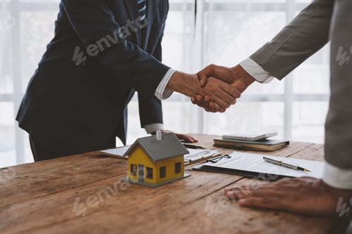 Preview: Handshake of real estate brokers with customers or investors, mortgage loan agreements Make a lease-
