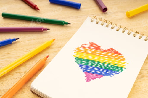 Preview: Notebook with LGBT rainbow flag heart shaped drawing