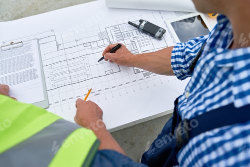 Preview: Builders Looking at Floor Plans