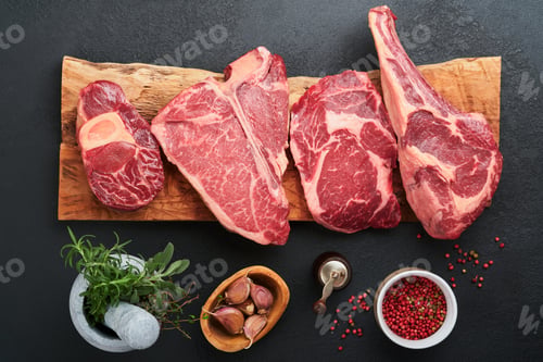 Preview: Raw prime steaks. Variety of fresh black angus prime meat steaks T-bone, New York, Ribeye, Striploin