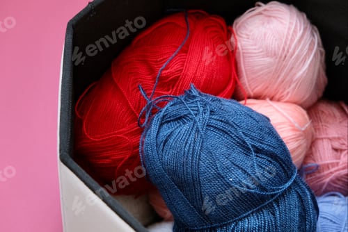 Preview: Multicolored skeins of woolen threads for knitting