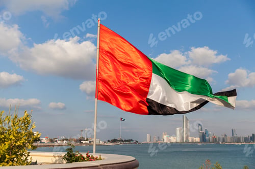 Preview: UAE flag with Abu Dhabi cityscape at the background, patriotism, flag day, national day