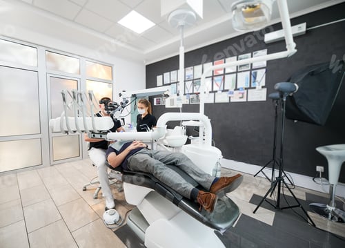 Preview: Dentists, working in clinic, examining, inspecting problem.