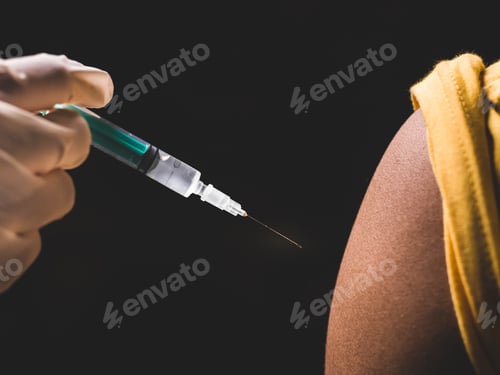 Preview: Getting vaccine with syringe for covid 19 stock image.