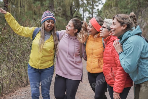 Preview: Multiracial women enjoy hiking in nature - Multi generational friends having fun during trekking day