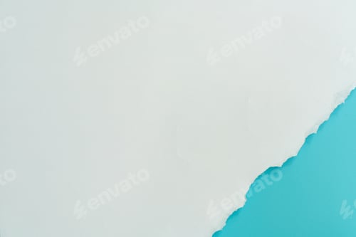 Preview: Top view blue sky torn paper on white and grey background. Bank copy space