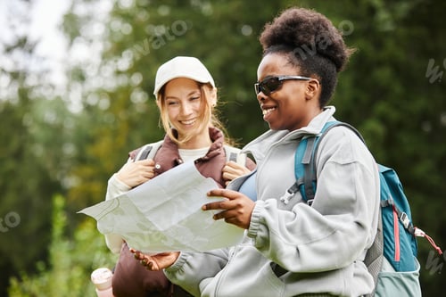 Preview: Two Women Looking at Map Hiking