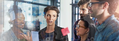 Preview: Creative people, meeting and talk at glass for workshop, training or project management in office b