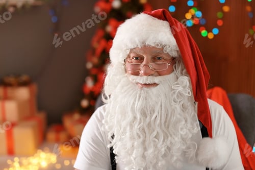 Preview: Authentic Santa Claus with bushy beard indoors