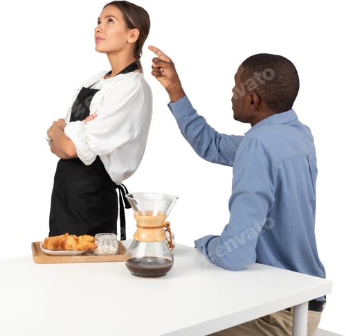 Preview: a man and a woman standing at a table with a blender