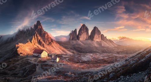 Aperçu: Mountain valley with beautiful house and church at sunset