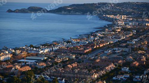 Preview: Aerial view of a scenic shore with buildings in Xabia, Spain