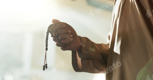 Preview: Prayer, beads and hand of muslim man in mosque, temple or Islam worship of Allah in spiritual, medi